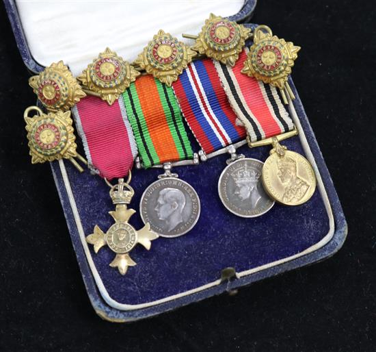 A cased group of miniatures including MBE and six epaulette pips